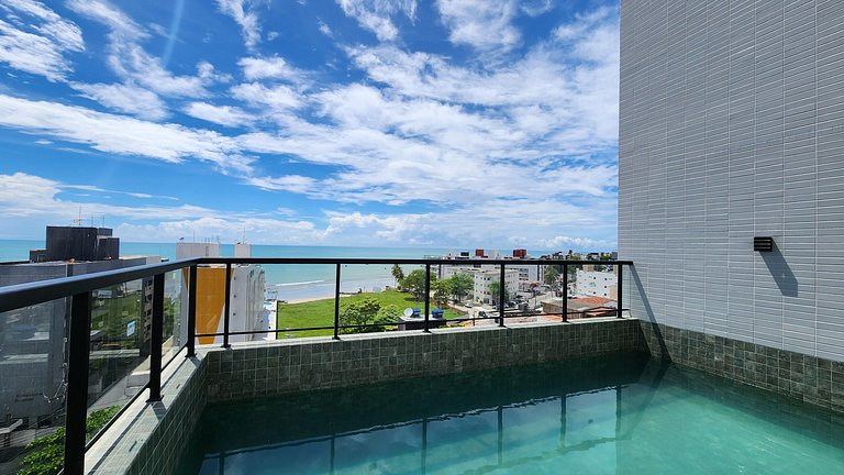Studio perto de tudo com rooftop e piscina