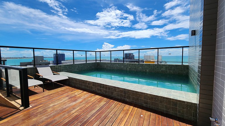 Studio perto de tudo com rooftop e piscina