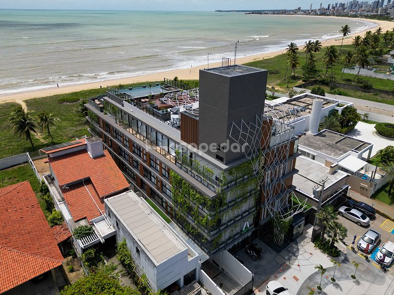 Studio elegante pé na areia