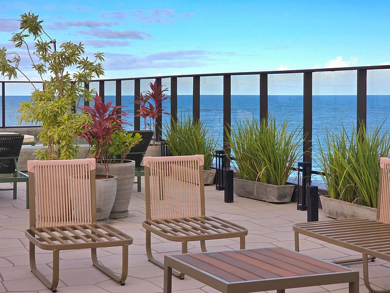 Pé na areia com vista incrível em Jardim Oceania