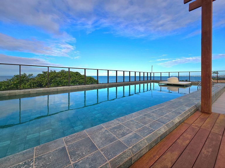 Pé na areia com vista incrível em Jardim Oceania