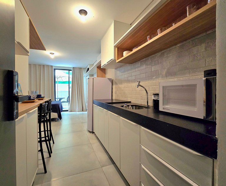 Flat novo c/ piscina rooftop próx. ao mar