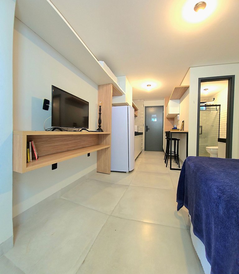 Flat novo c/ piscina rooftop próx. ao mar