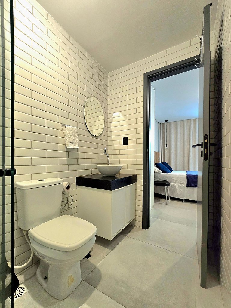 Flat novo c/ piscina rooftop próx. ao mar