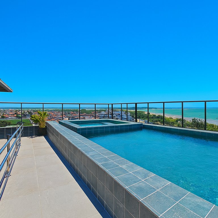 Vista para o mar com piscina deslumbrante
