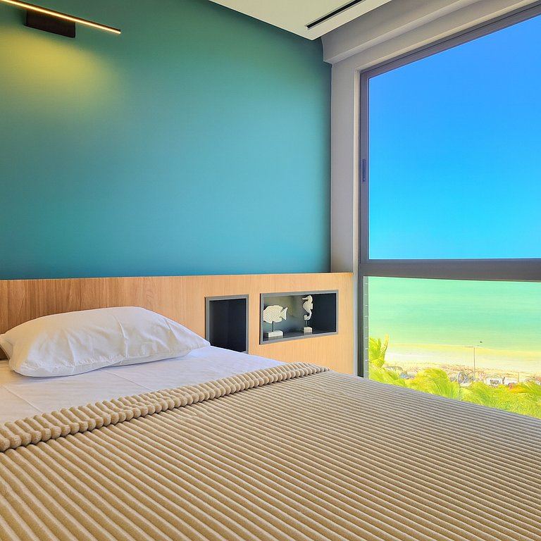 Frente mar com rooftop e piscina