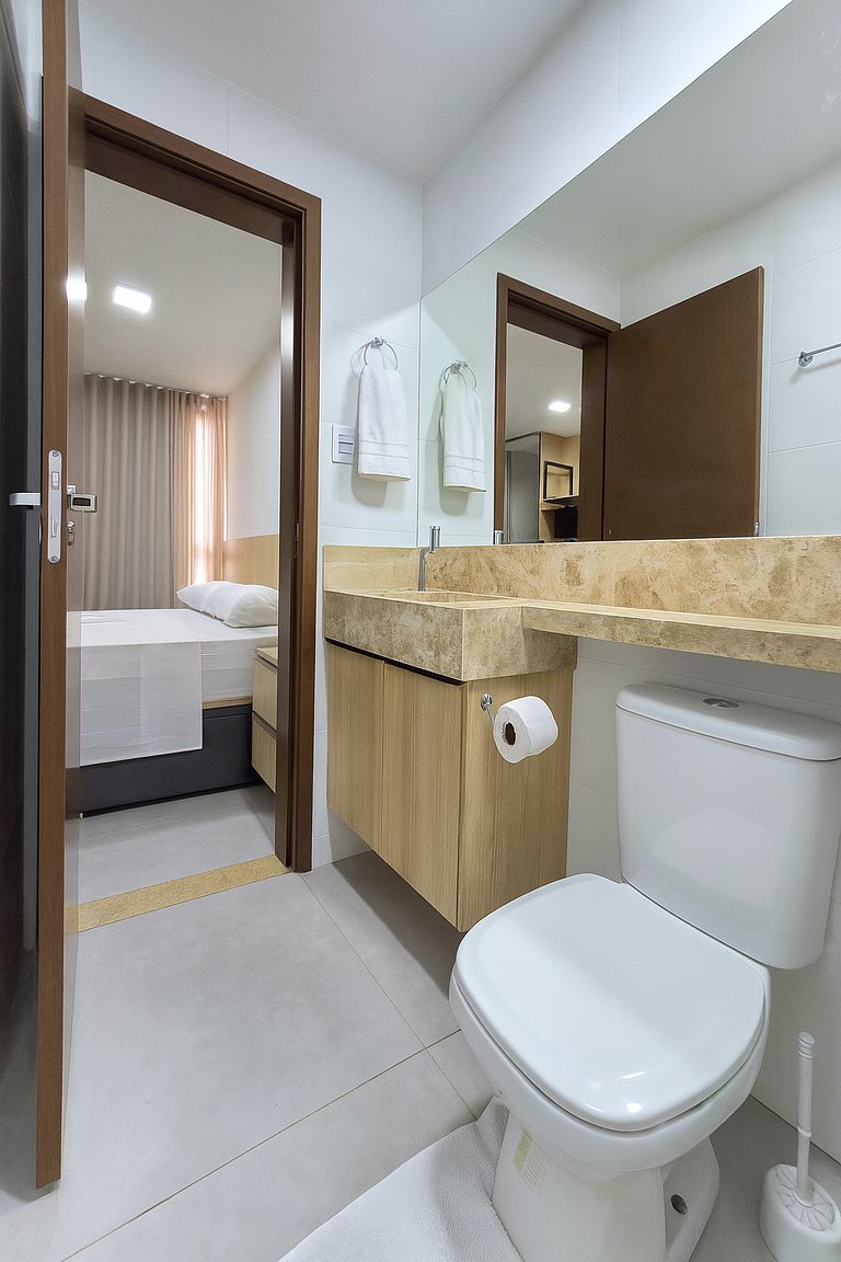 Studio perto de tudo com rooftop e piscina
