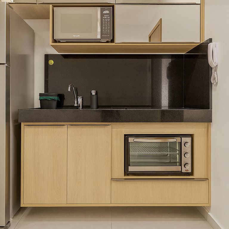 Studio perto de tudo com rooftop e piscina