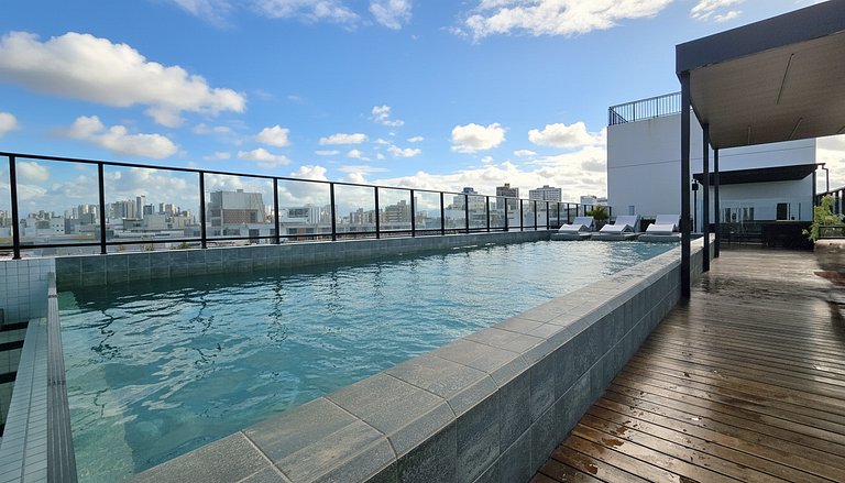 Studio moderno com rooftop vista mar