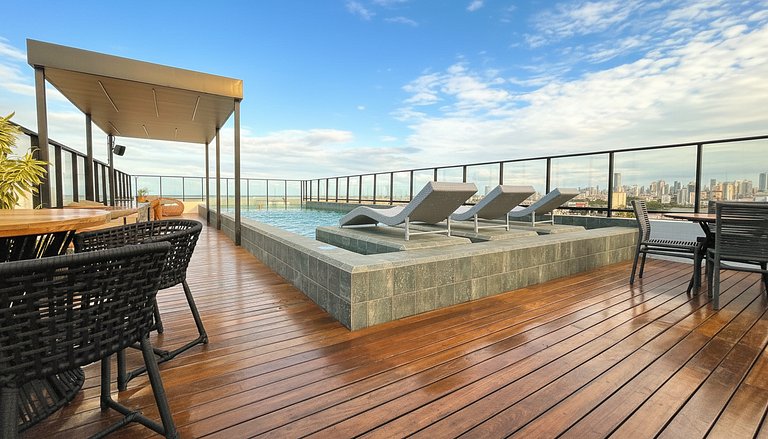 Studio moderno com rooftop vista mar