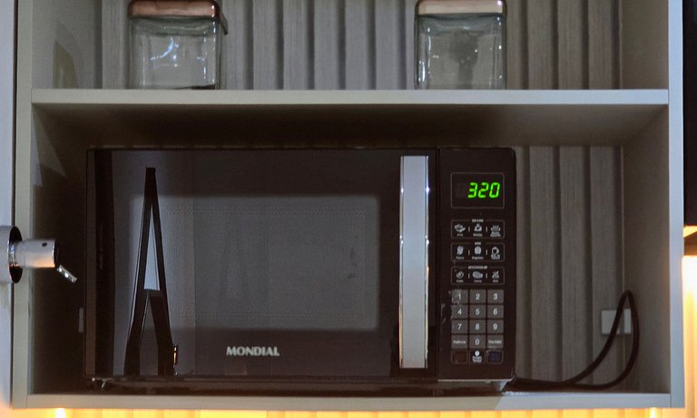 Studio moderno com rooftop vista mar