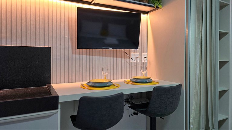 Studio moderno com rooftop vista mar