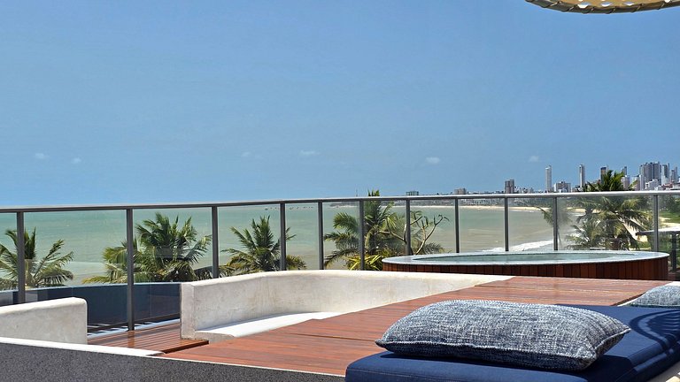 Studio luxo pé na areia com vista lateral para mar