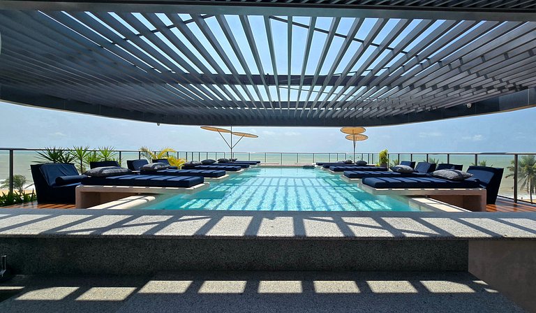 Studio luxo pé na areia com vista lateral para mar