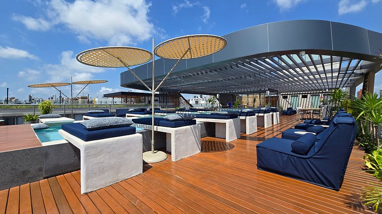 Studio luxo pé na areia com vista lateral para mar