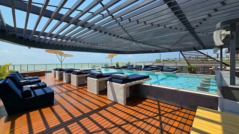 Studio luxo pé na areia com vista lateral para mar