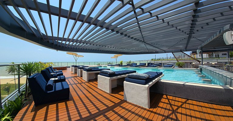 Studio luxo pé na areia com vista lateral para mar