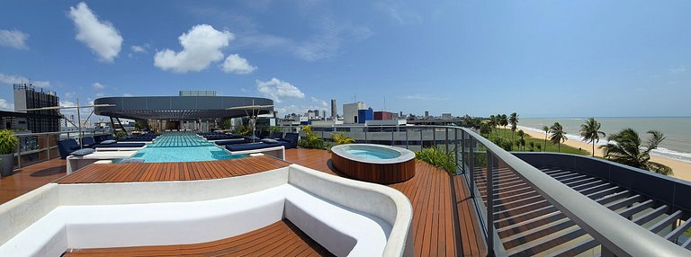 Studio luxo pé na areia com vista lateral para mar