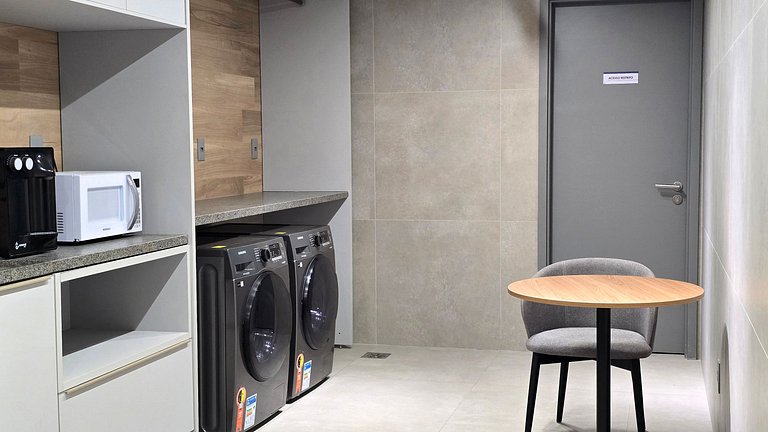 Studio luxo pé na areia com vista lateral para mar