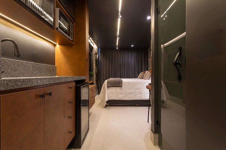 Studio luxo pé na areia com vista lateral para mar