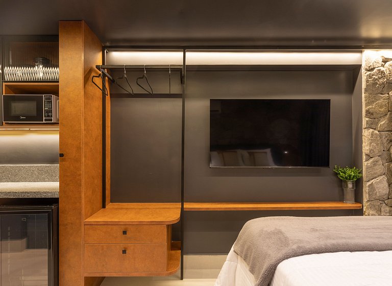 Studio luxo pé na areia com vista lateral para mar