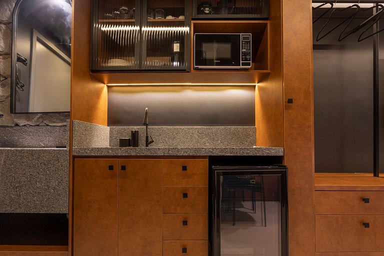 Studio luxo pé na areia com vista lateral para mar