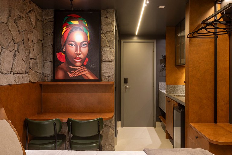 Studio luxo pé na areia com vista lateral para mar