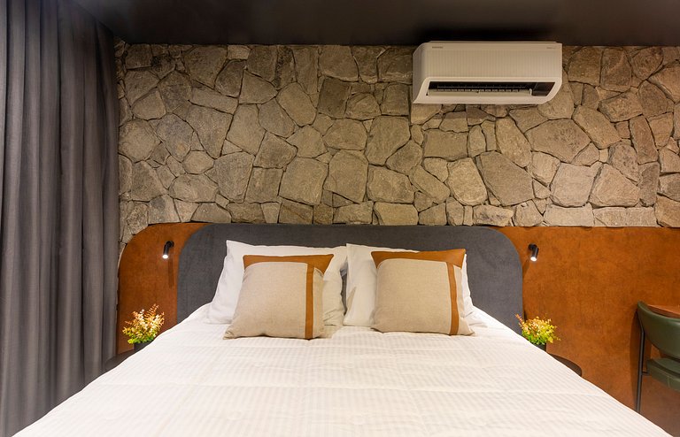 Studio luxo pé na areia com vista lateral para mar