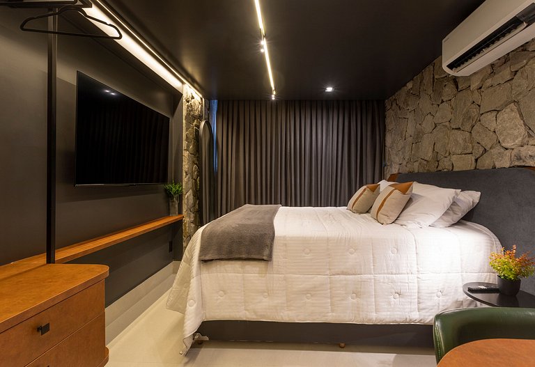 Studio luxo pé na areia com vista lateral para mar