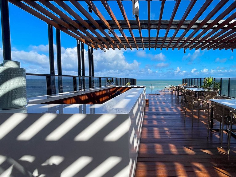 Pé na areia, vista lateral, piscina, academia