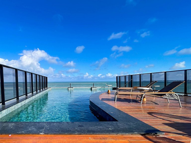 Pé na areia, vista lateral, piscina, academia