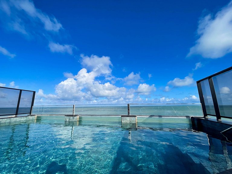 Pé na areia, vista lateral, piscina, academia