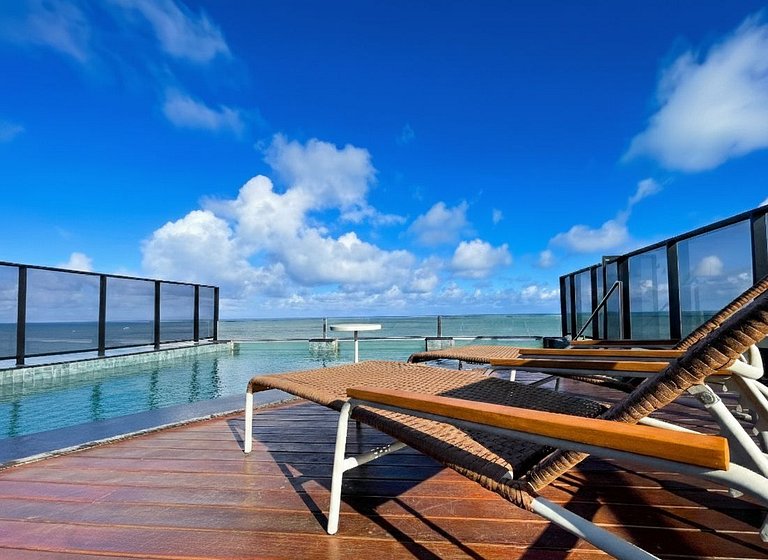 Pé na areia, vista lateral, piscina, academia