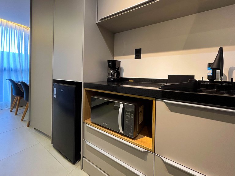 Pé na areia, vista lateral, piscina, academia