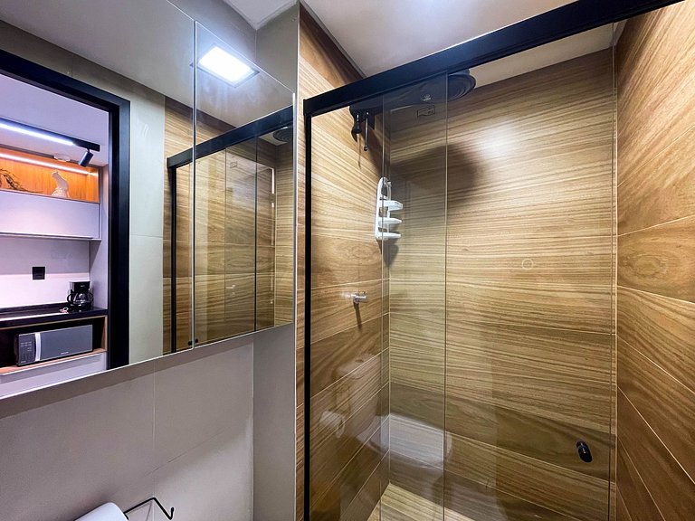 Pé na areia, vista lateral, piscina, academia