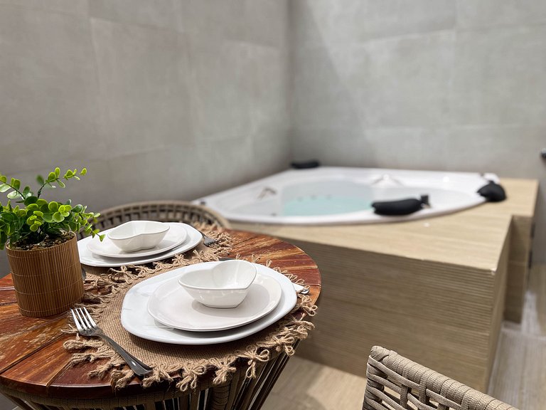 Studio com hidro privativa e rooftop exclusivo