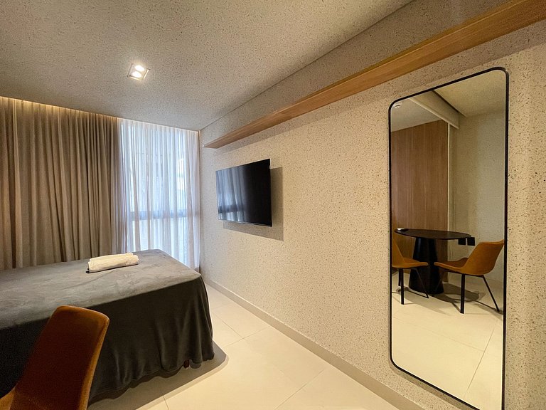 Studio elegante pé na areia