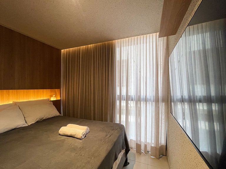 Studio elegante pé na areia