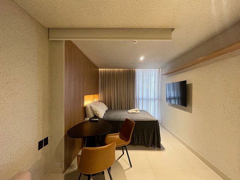 Studio elegante pé na areia