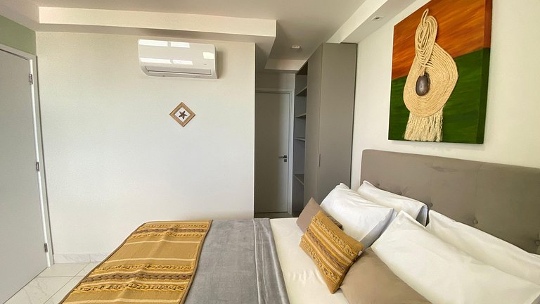 Pé na areia, 2 quartos, vista pro mar